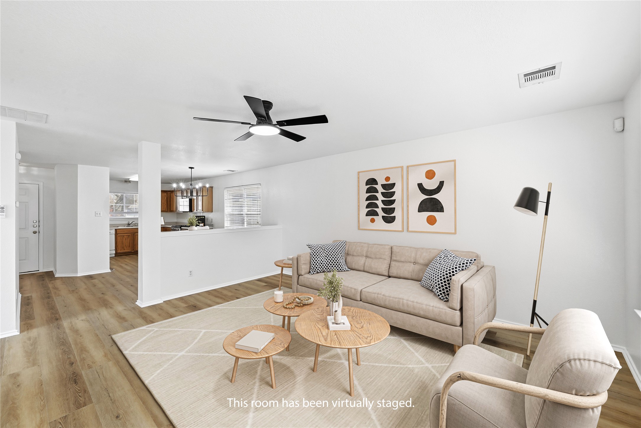 332 Wetzel Kyle, TX 78640 - Photo 4 of 31 a living room with furniture and a wooden floor