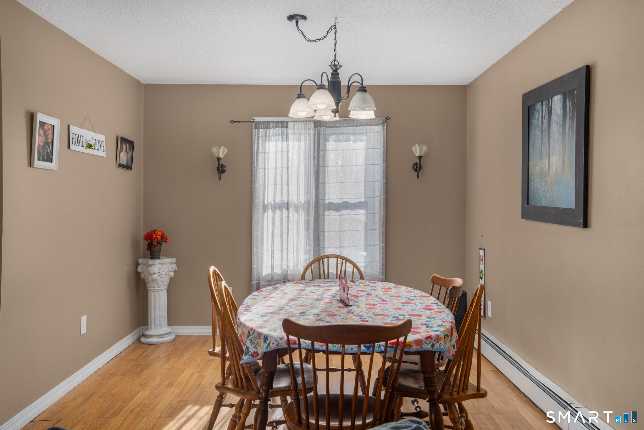 83 Kate Downing Road Plainfield, CT 06374 - Photo 19 of 40 a view of a dining room with furniture window and outside view