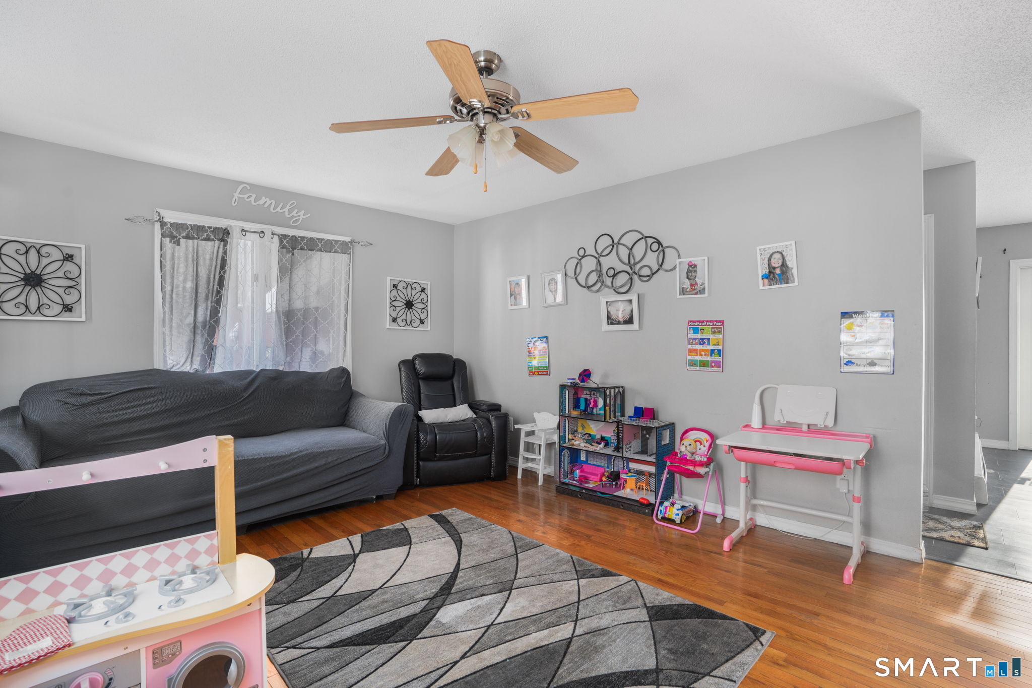 83 Kate Downing Road Plainfield, CT 06374 - Photo 21 of 40 a living room with furniture and a table