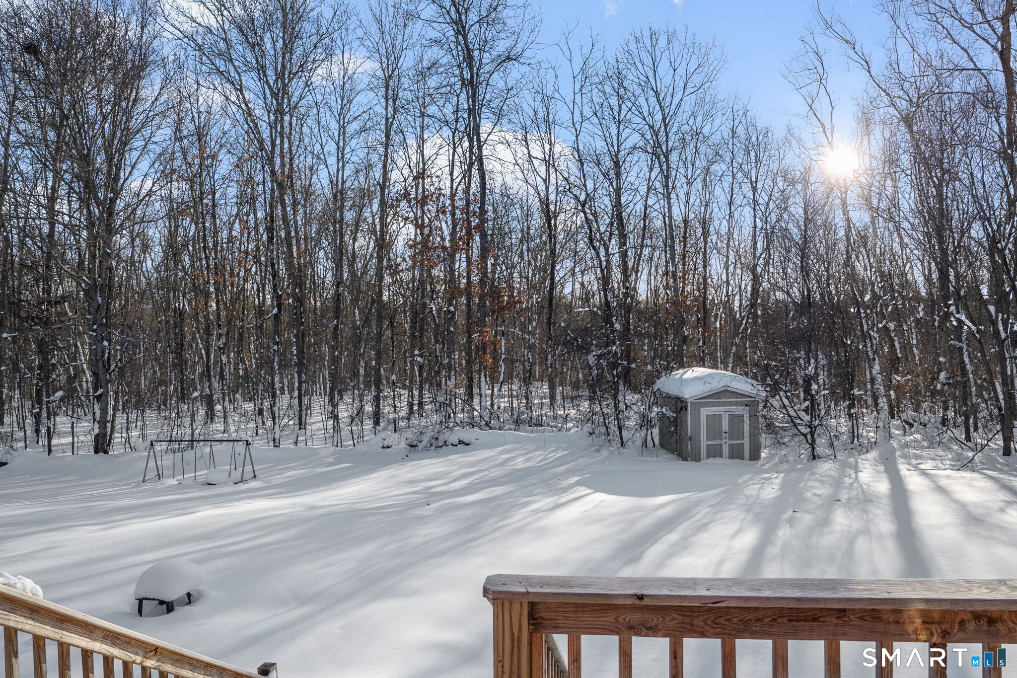 83 Kate Downing Road Plainfield, CT 06374 - Photo 24 of 40 a wooden bench sitting in the middle of a park