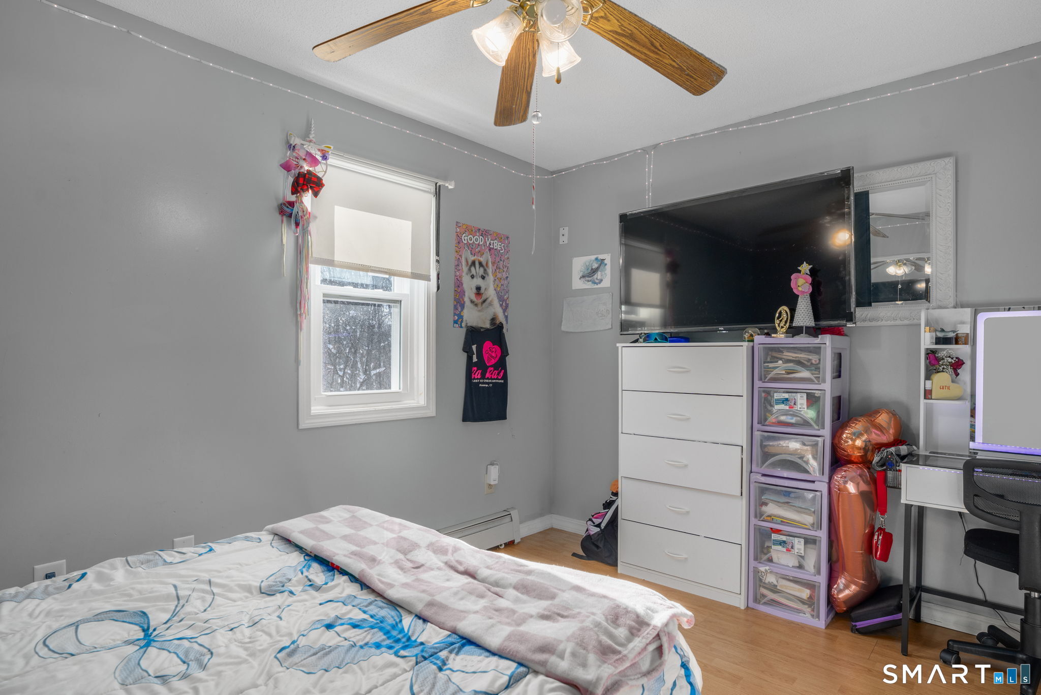 83 Kate Downing Road Plainfield, CT 06374 - Photo 32 of 40 a bedroom with a bed and flat screen tv