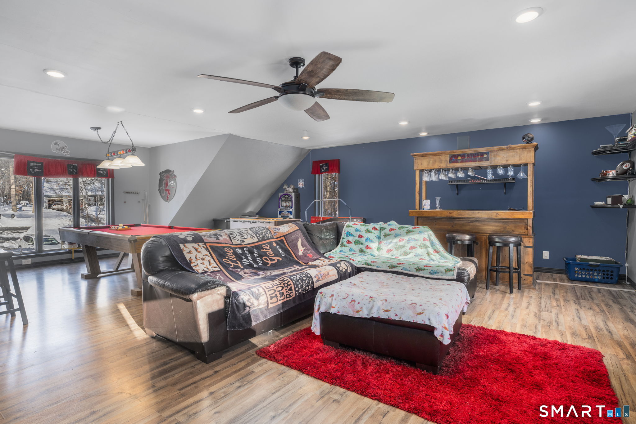83 Kate Downing Road Plainfield, CT 06374 - Photo 35 of 40 a living room with furniture and a flat screen tv