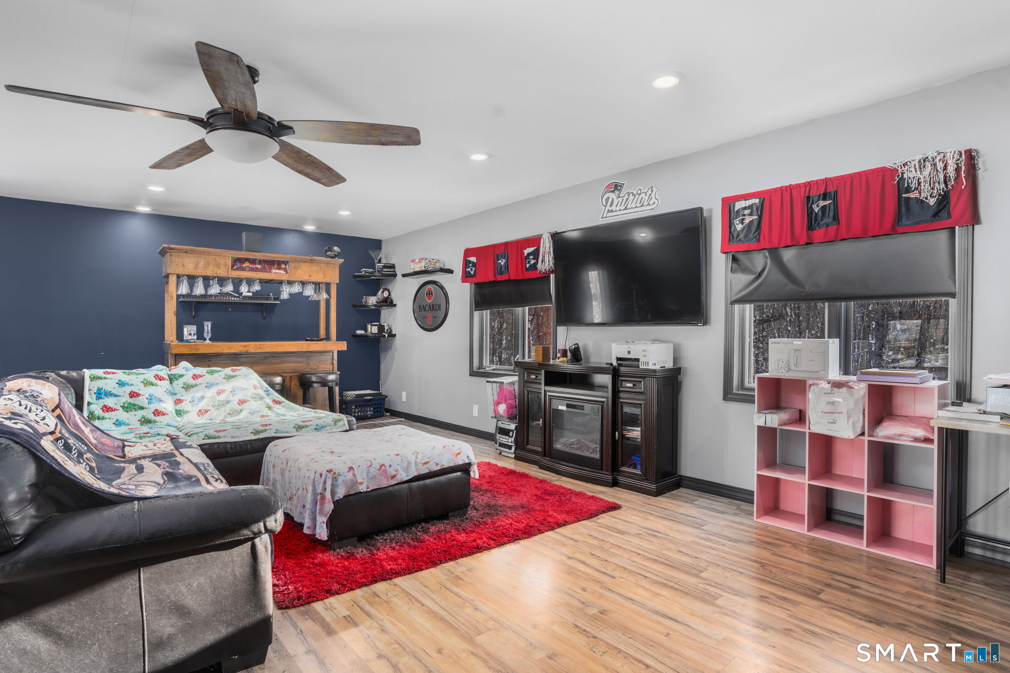 83 Kate Downing Road Plainfield, CT 06374 - Photo 36 of 40 a living room with furniture and a flat screen tv