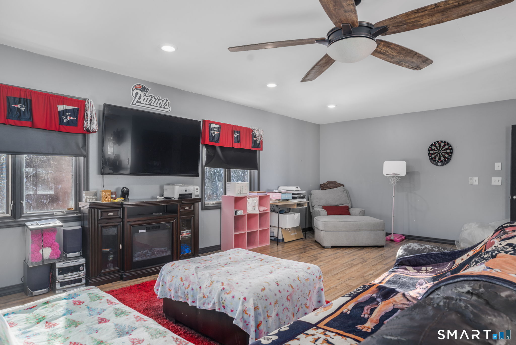 83 Kate Downing Road Plainfield, CT 06374 - Photo 38 of 40 a living room with furniture and a flat screen tv