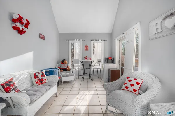 a living room with furniture and a couch
