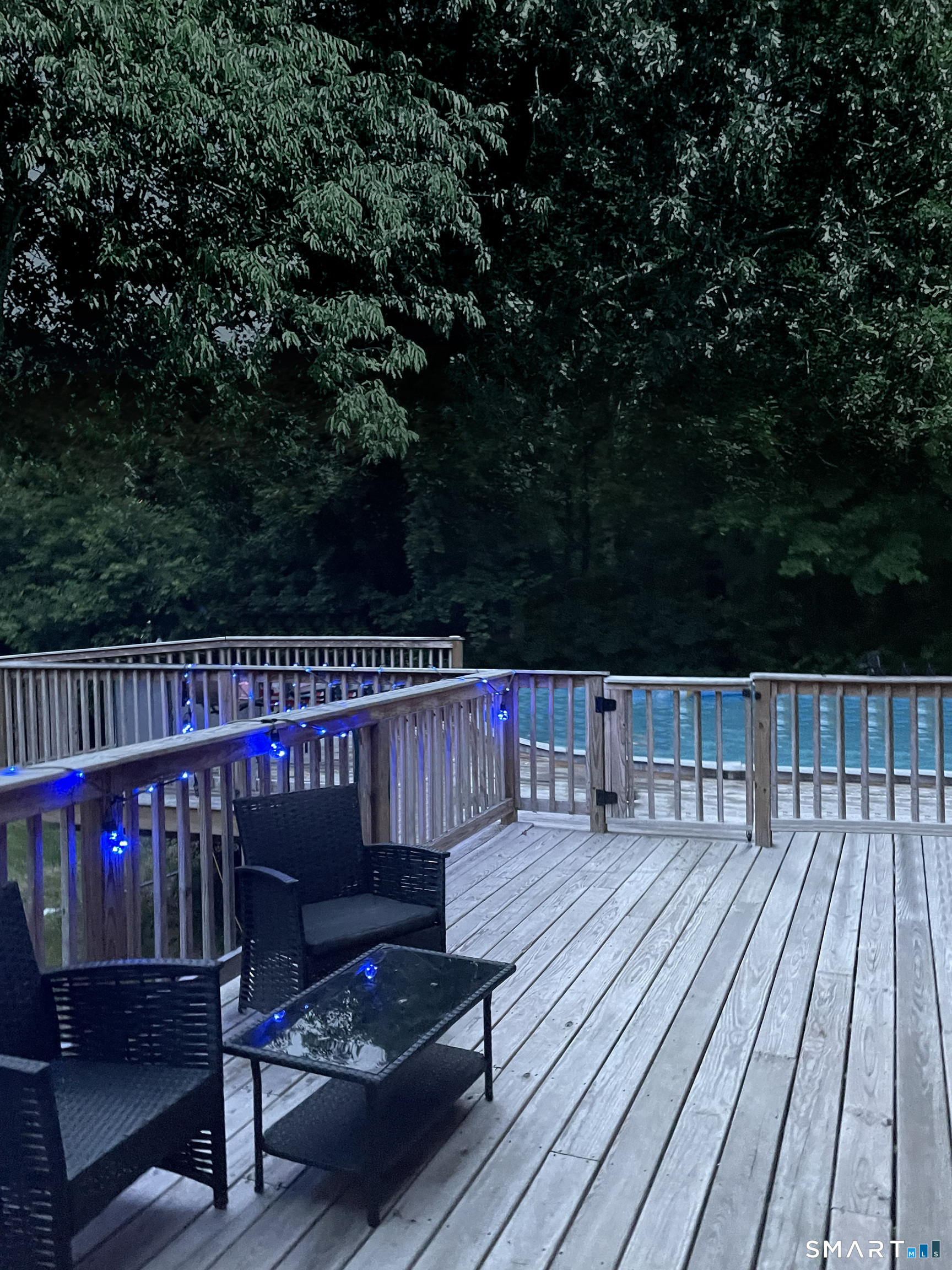 83 Kate Downing Road Plainfield, CT 06374 - Photo 10 of 40 a view of deck with table a barbeque grill with wooden floor and fence