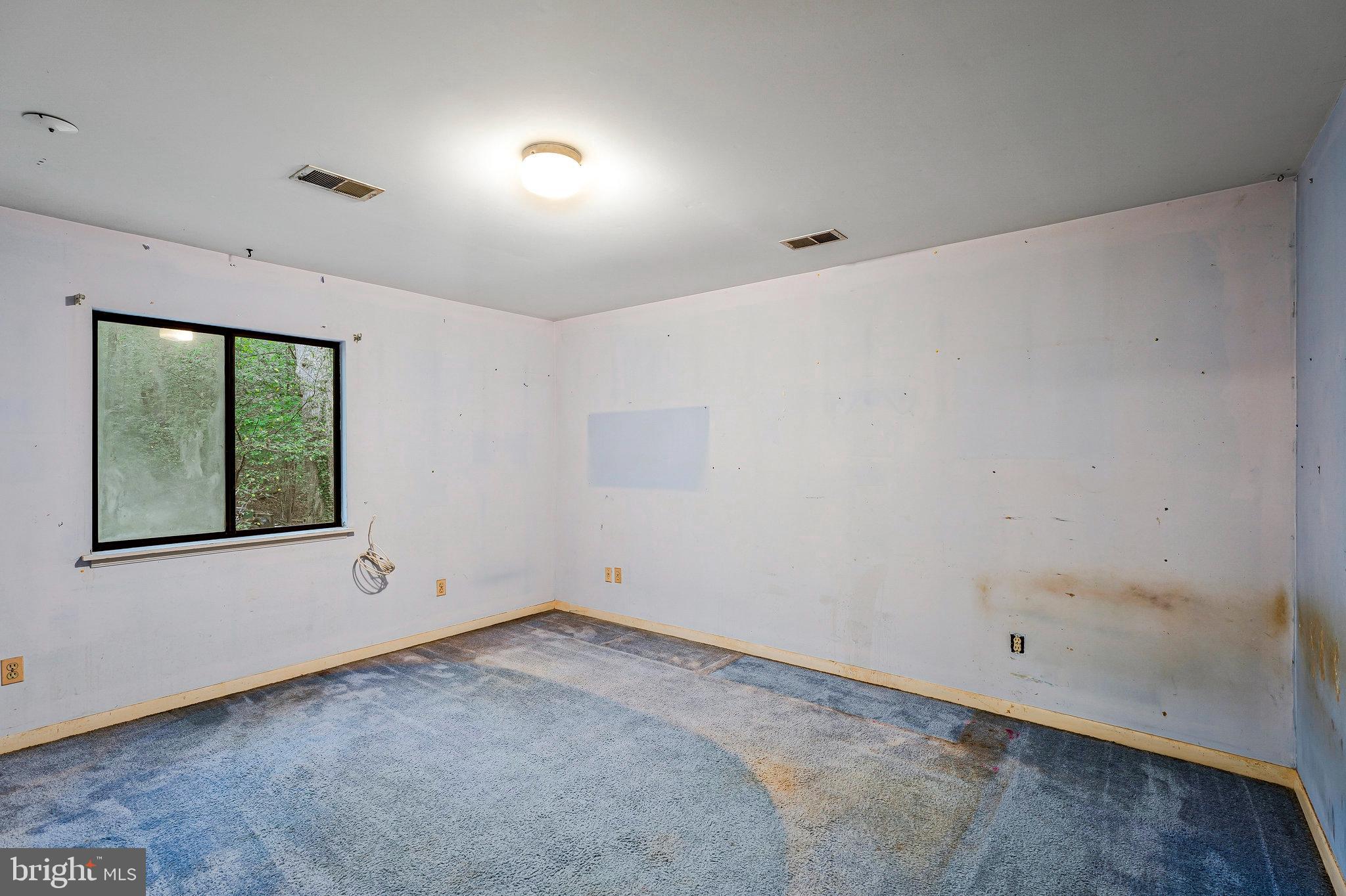 10400 Hampton Road Fairfax Station, VA 22039 - Photo 29 of 53 a view of an empty room with a window