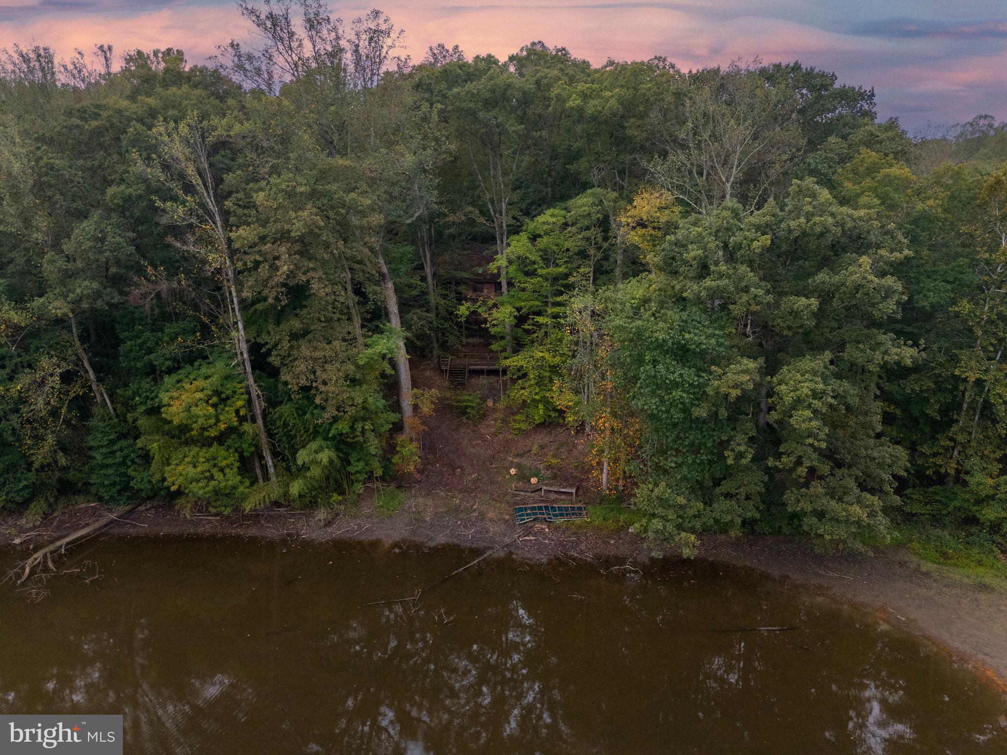 10400 Hampton Road Fairfax Station, VA 22039 - Photo 4 of 53 a view of a street with a trees in the background
