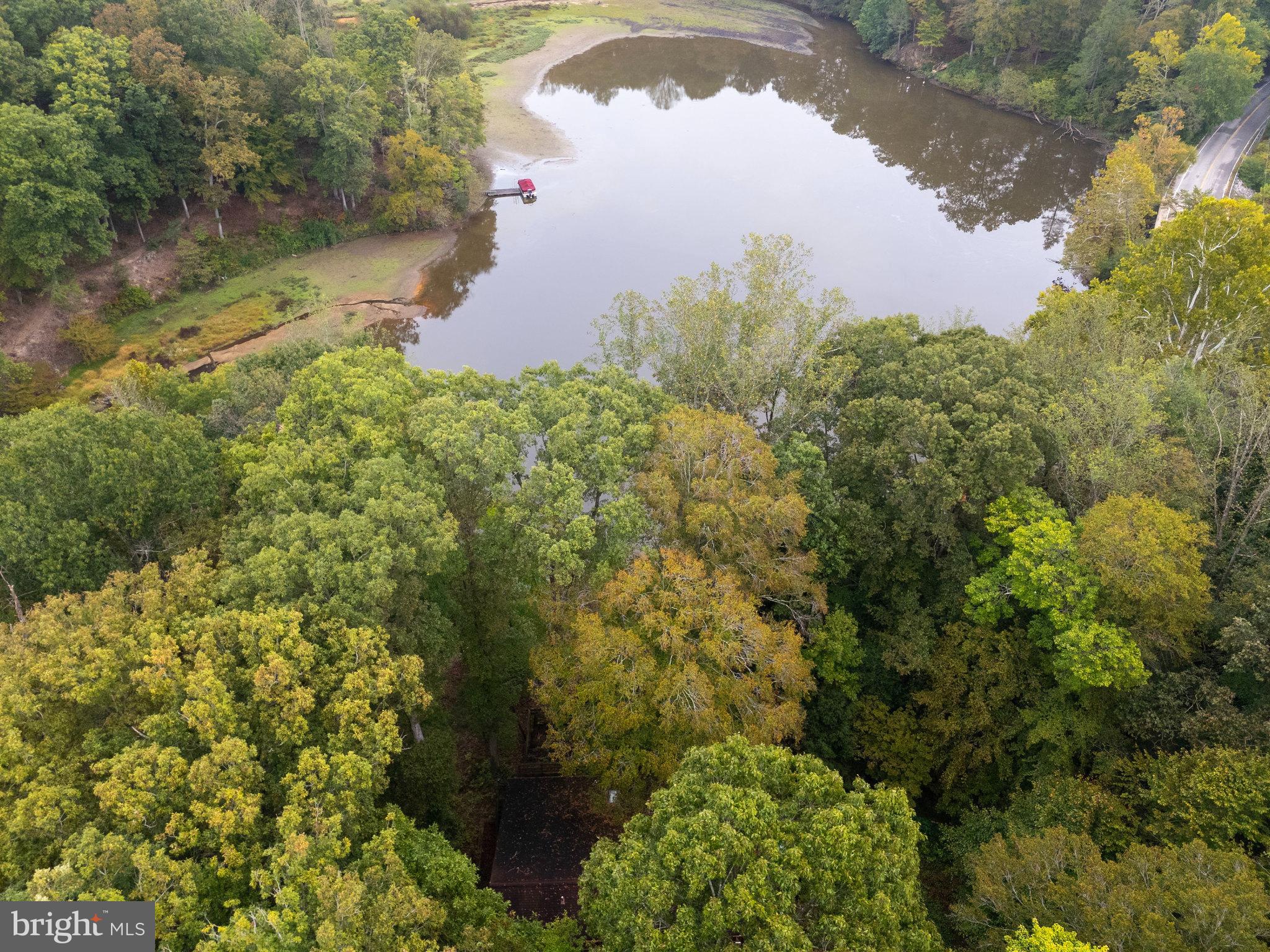 10400 Hampton Road Fairfax Station, VA 22039 - Photo 47 of 53 a view of a lake with a yard