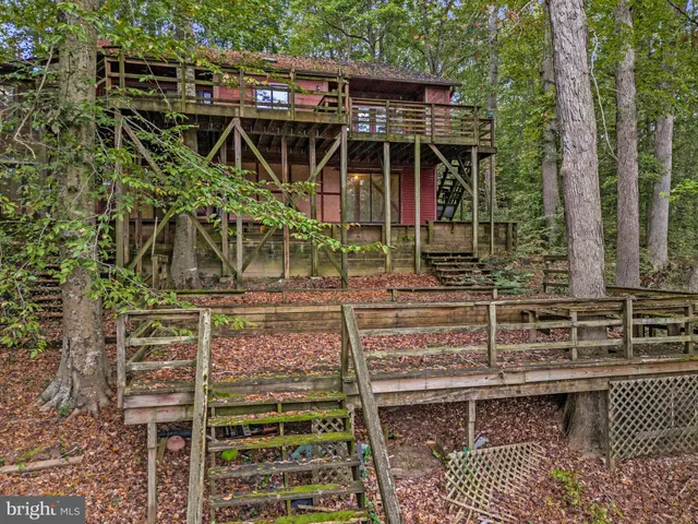 a view of a house with a window and wooden floor