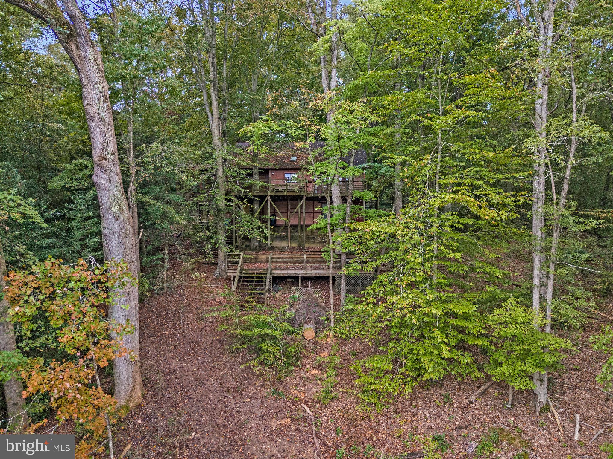 10400 Hampton Road Fairfax Station, VA 22039 - Photo 10 of 53 a backyard of a house with lots of green space and fountain