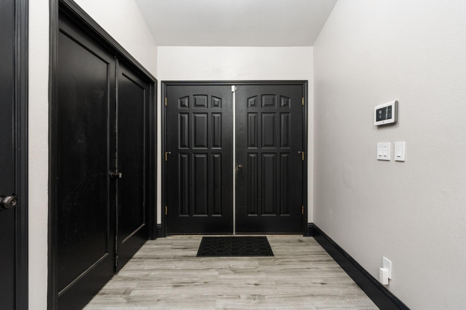 36345 Mudge Ranch Road Coarsegold, CA 93614 - Photo 3 of 51 a close view of wooden door