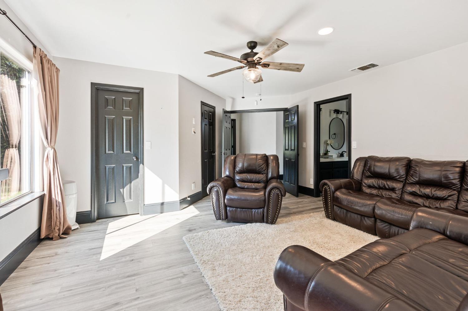 36345 Mudge Ranch Road Coarsegold, CA 93614 - Photo 32 of 51 a living room with furniture and a window
