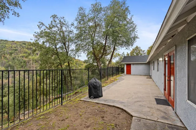 a view of a street from a balcony
