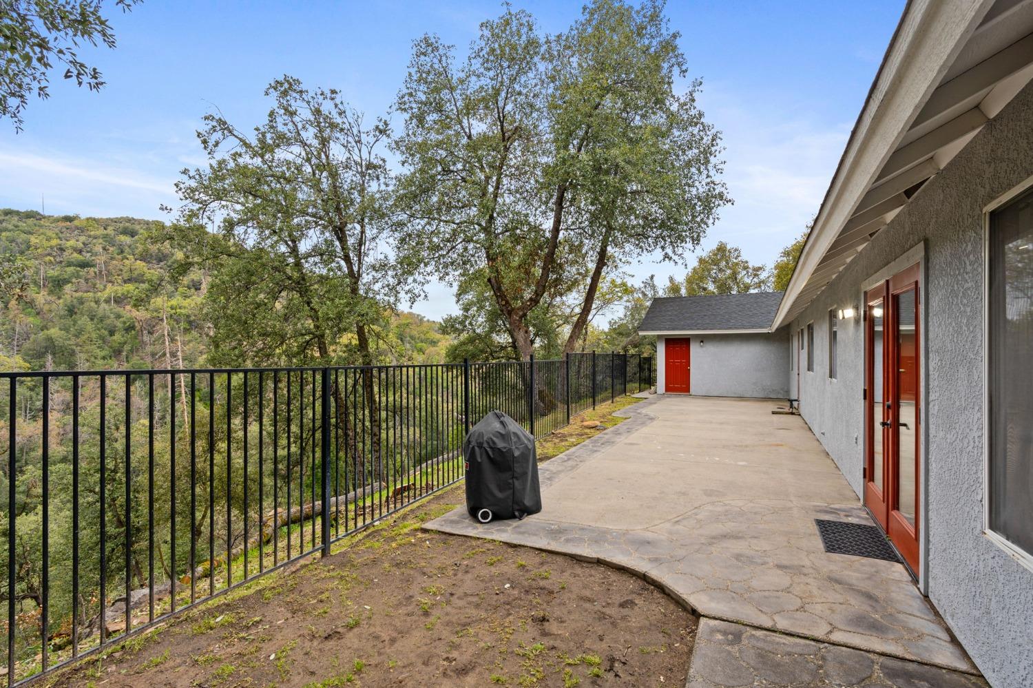 36345 Mudge Ranch Road Coarsegold, CA 93614 - Photo 34 of 51 a view of a street from a balcony