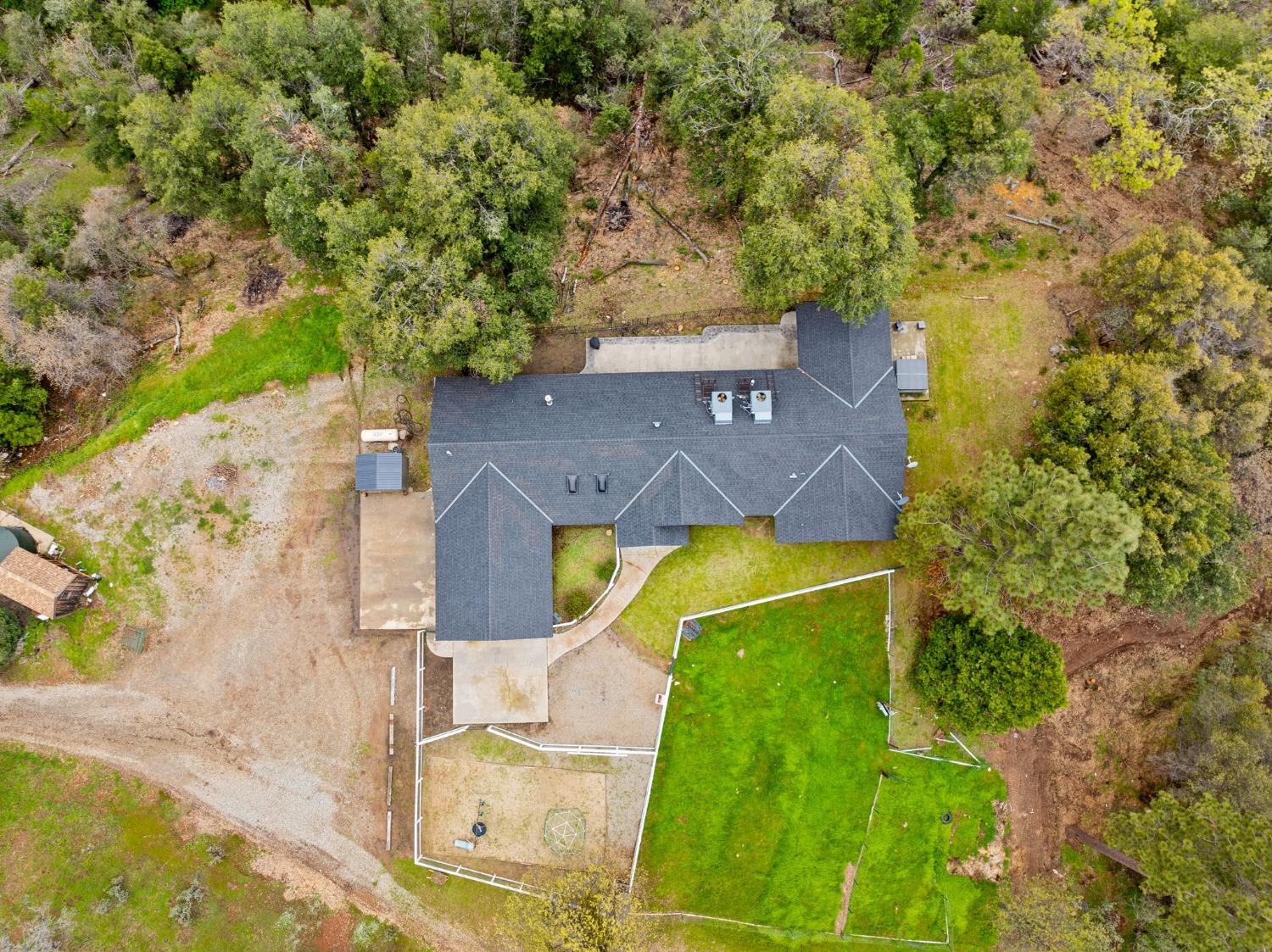 36345 Mudge Ranch Road Coarsegold, CA 93614 - Photo 51 of 51 an aerial view of a house with a yard