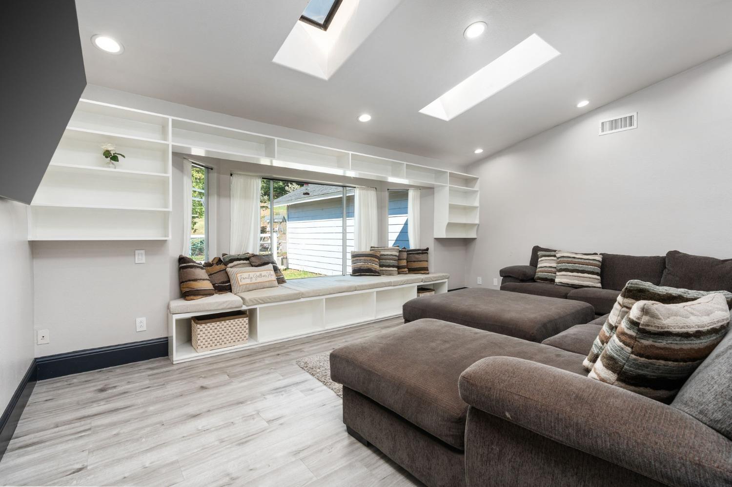 36345 Mudge Ranch Road Coarsegold, CA 93614 - Photo 7 of 51 a living room with furniture and wooden floor