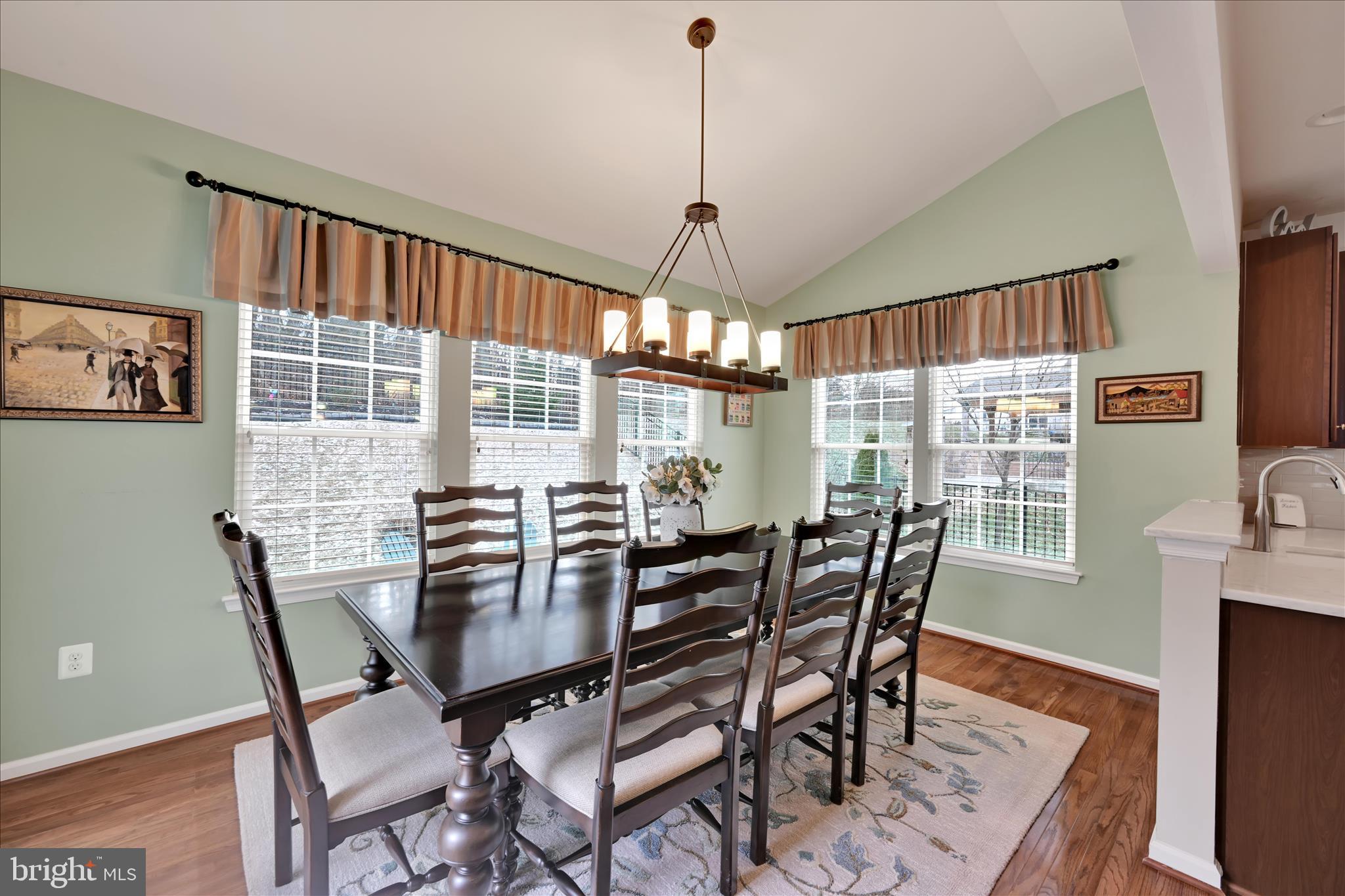1021 Countryside Road Seven Valleys, PA 17360 - Photo 12 of 36 a dining room with furniture a chandelier and wooden floor
