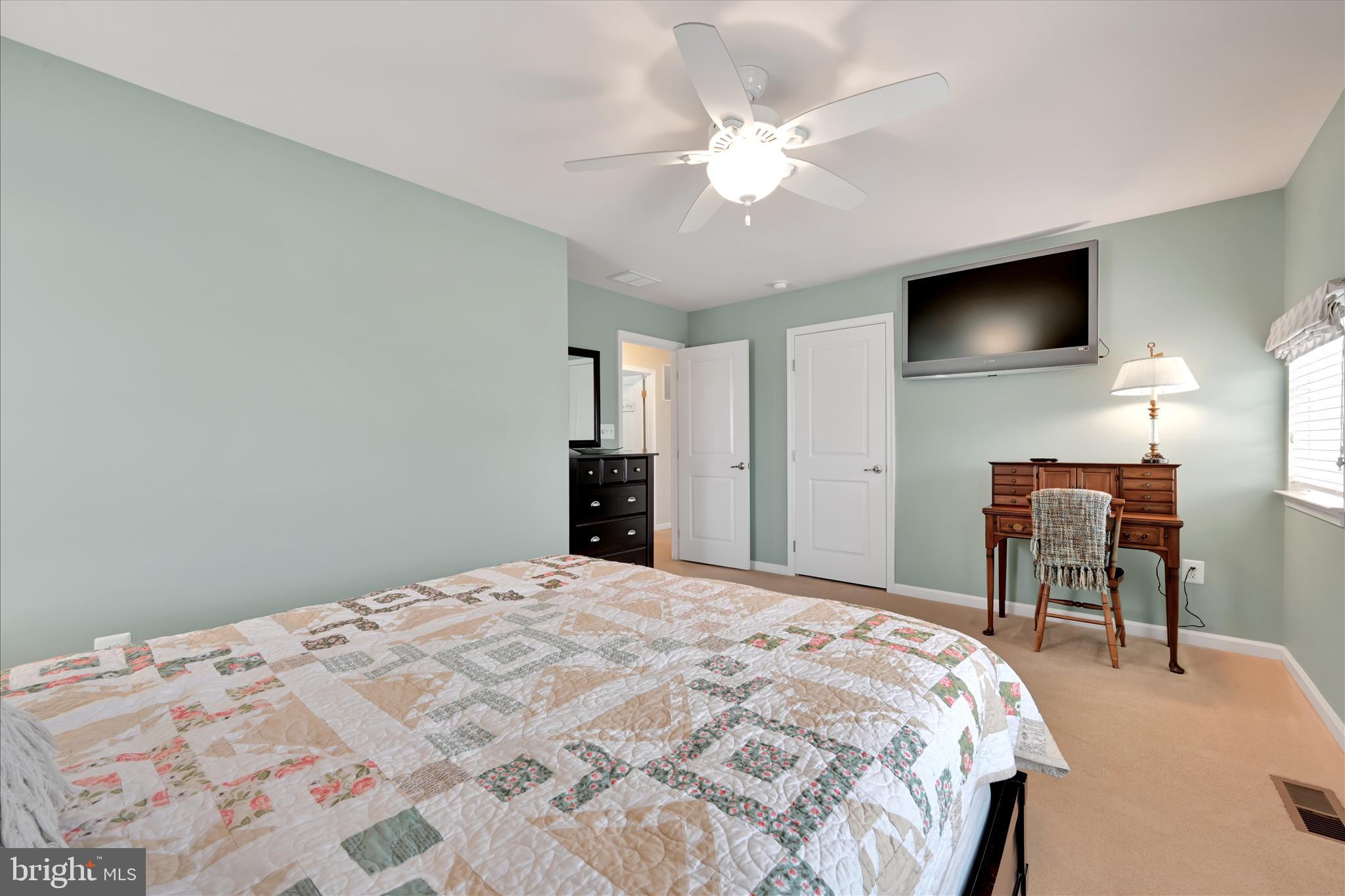 1021 Countryside Road Seven Valleys, PA 17360 - Photo 20 of 36 a bedroom with a bed and a flat screen tv