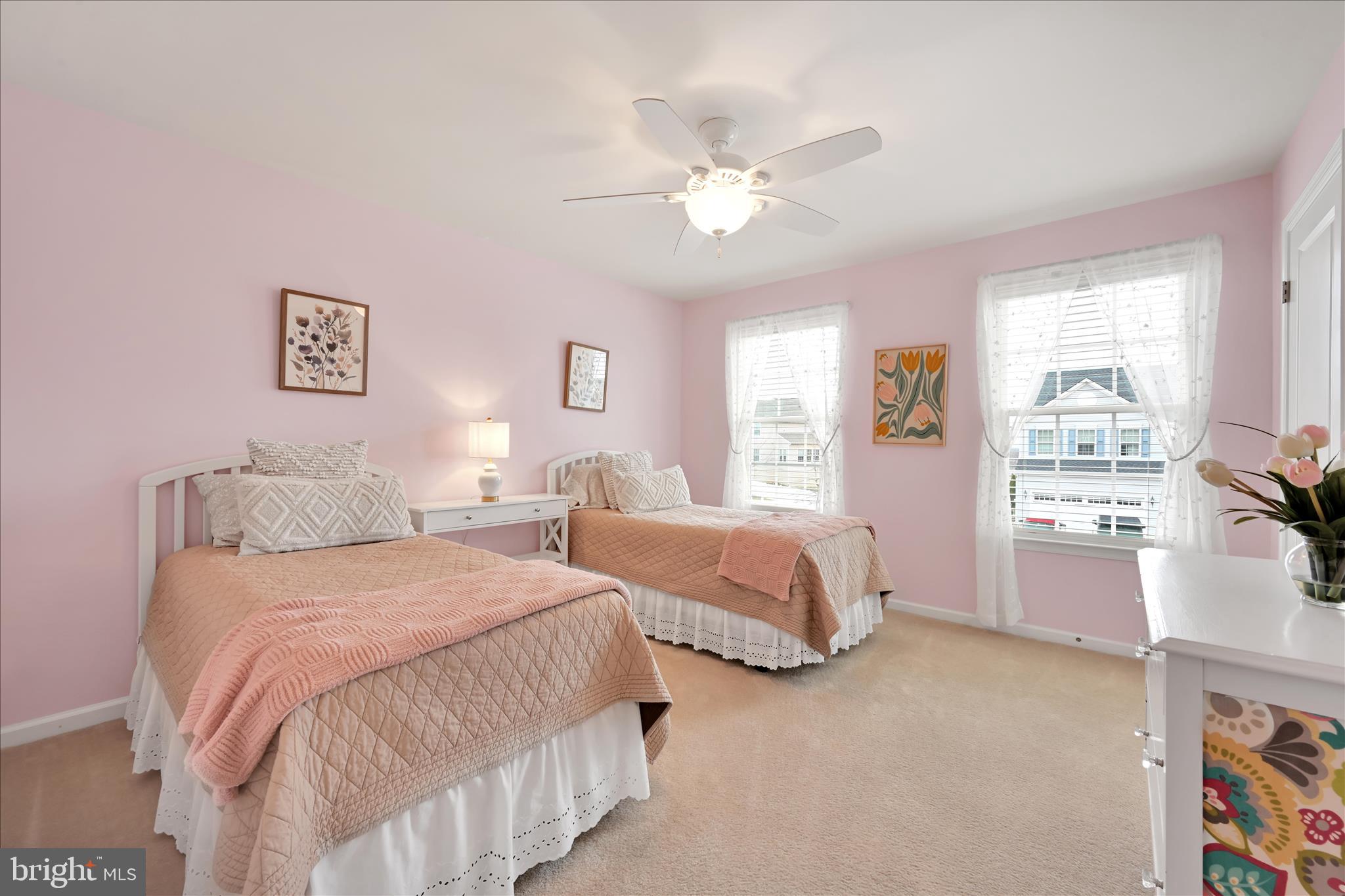 1021 Countryside Road Seven Valleys, PA 17360 - Photo 22 of 36 a spacious bedroom with two beds and a window