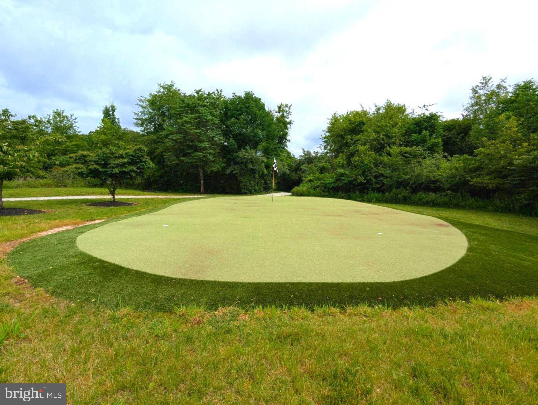 1021 Countryside Road Seven Valleys, PA 17360 - Photo 36 of 36 a view of a swimming pool with an outdoor space and seating area