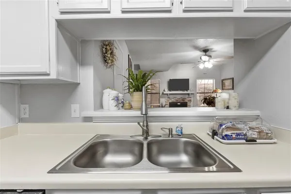 a kitchen with a stove and a microwave