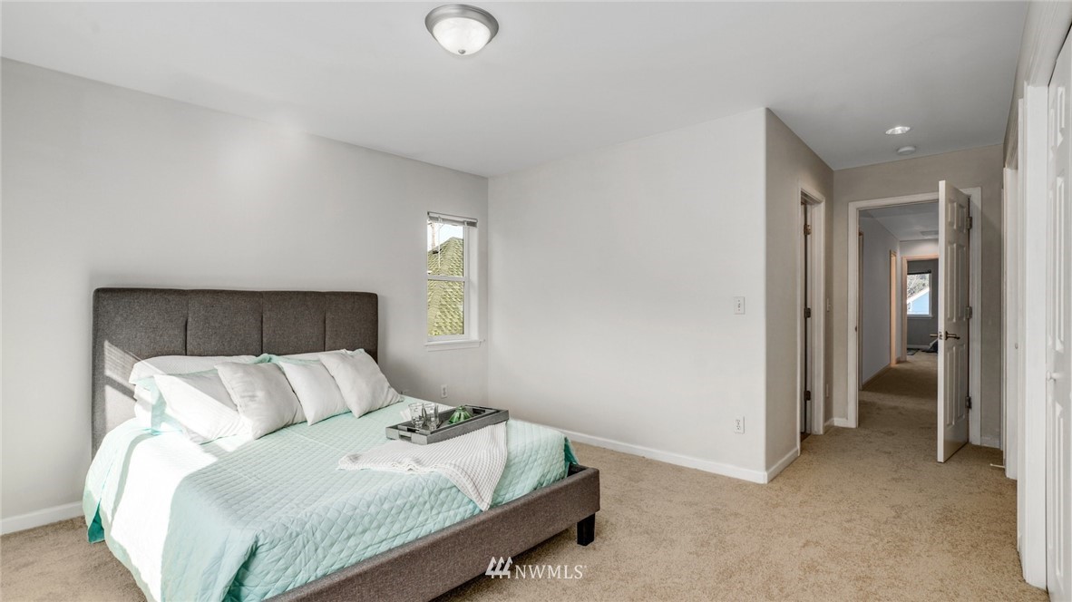 503 Smithers Avenue South Renton, WA 98057 - Photo 14 of 22 a bedroom with a bed and window