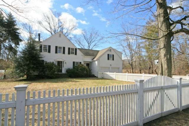 305 Westway Road Fairfield, CT 06890 - Photo 1 of 1 a front view of a house with a yard