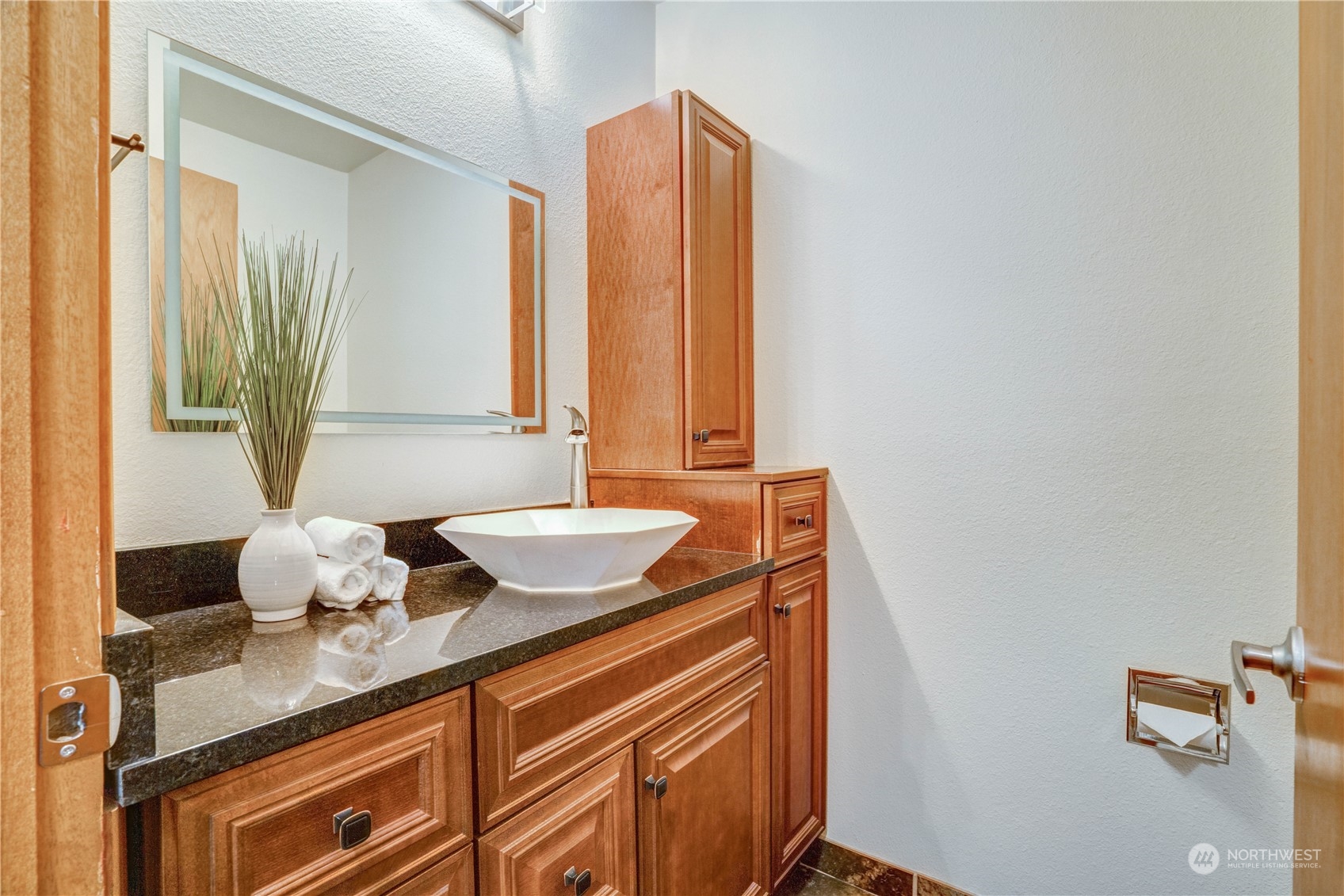 203 View Road Steilacoom, WA 98388 - Photo 5 of 22 a bathroom with a granite countertop sink and a mirror