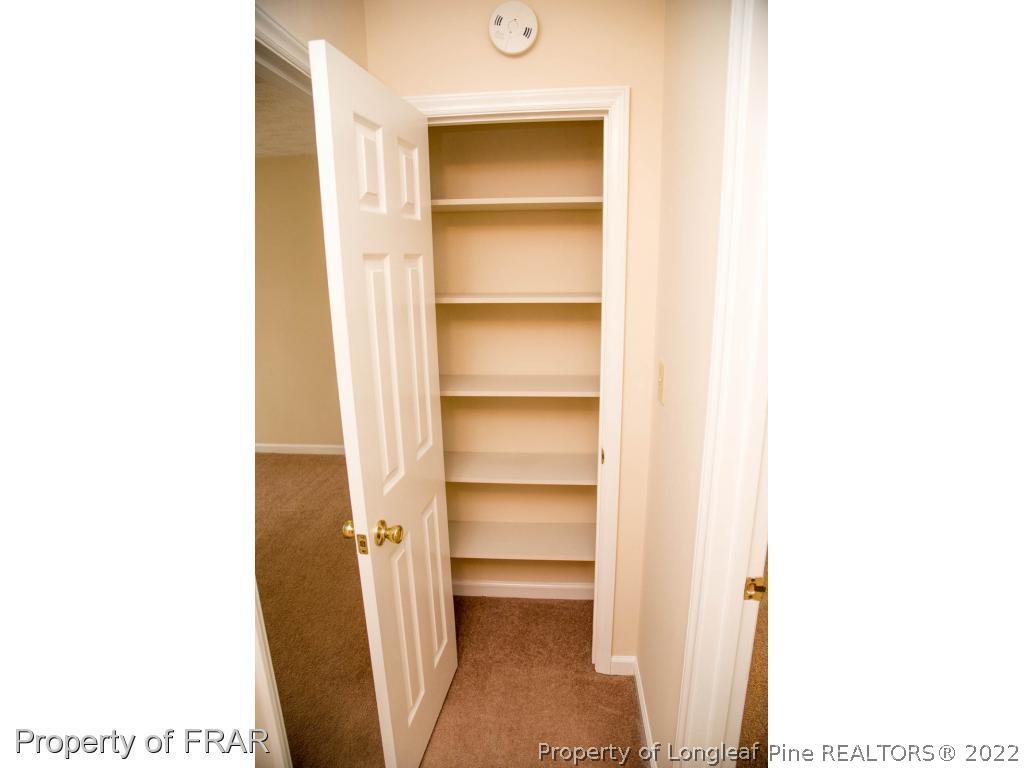 705 Rim Road Fayetteville, NC 28314 - Photo 22 of 26 a view of a room with rack on the wall