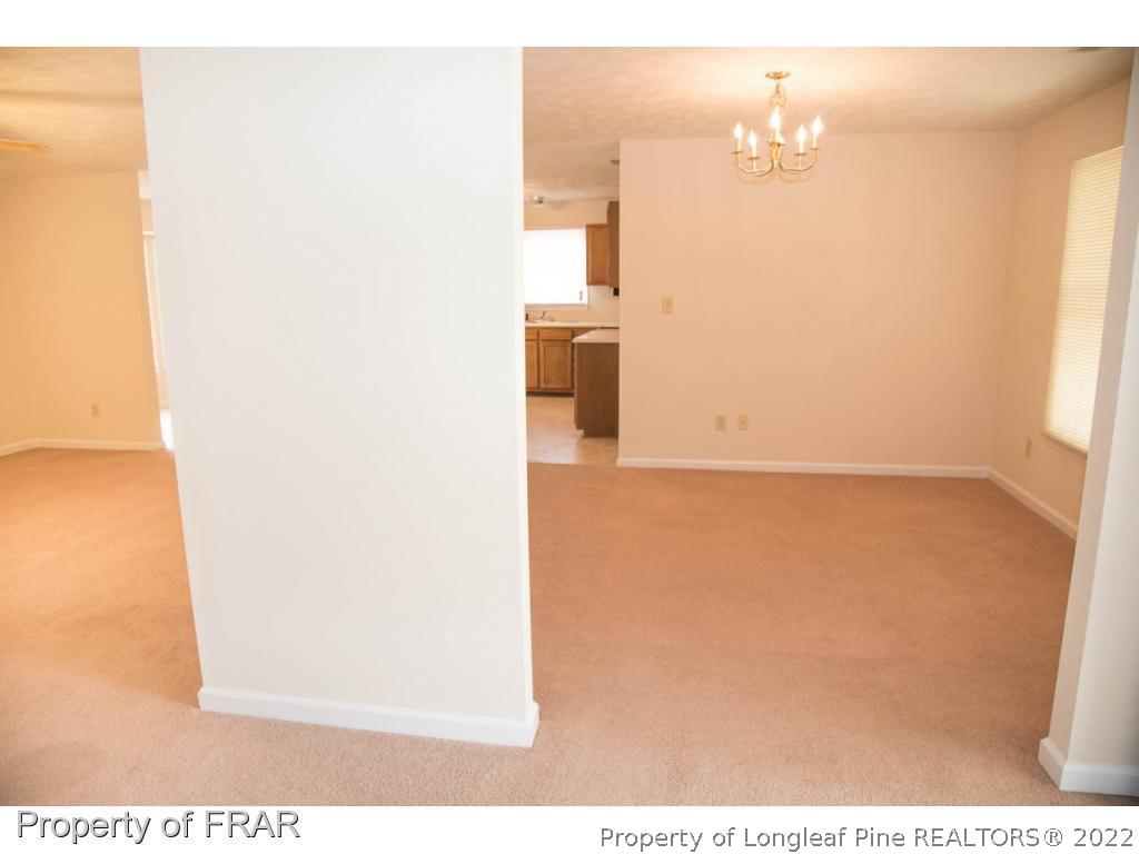 705 Rim Road Fayetteville, NC 28314 - Photo 23 of 26 a view of a hardwood floor in a kitchen