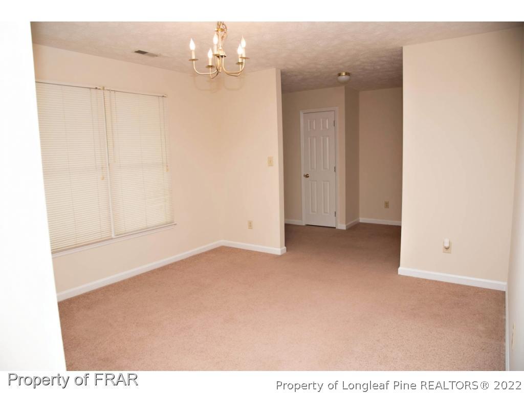 705 Rim Road Fayetteville, NC 28314 - Photo 9 of 26 a view of a room with an empty space