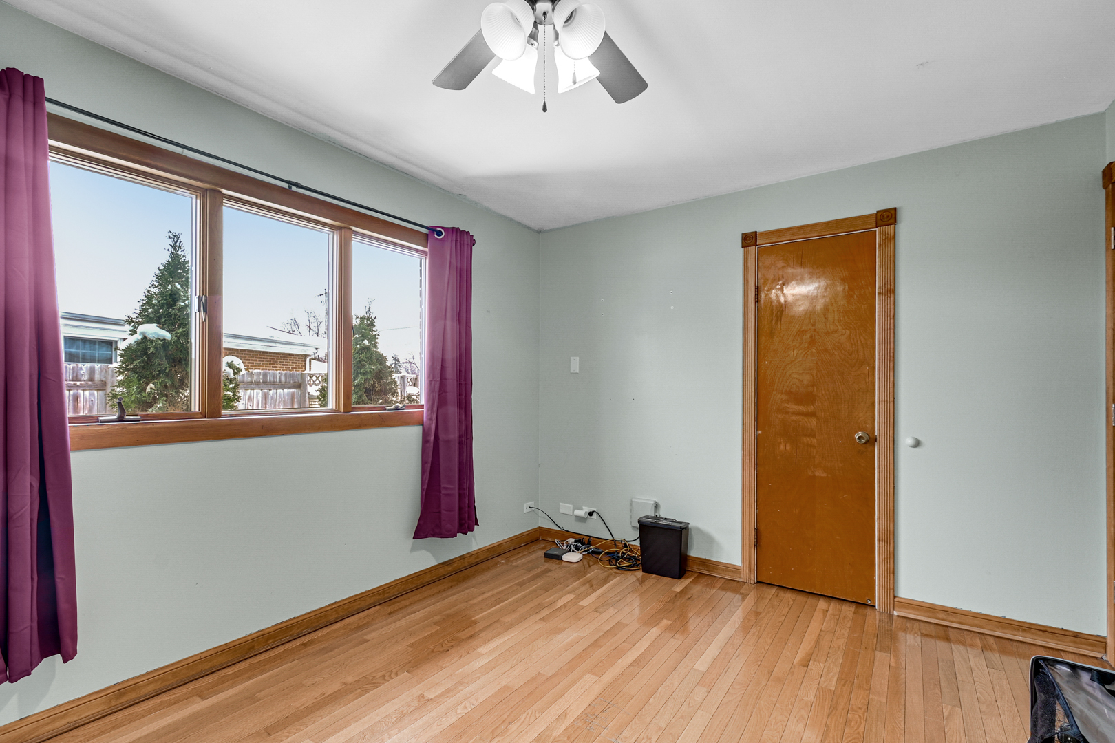 3740 153rd Street Midlothian, IL 60445 - Photo 14 of 20 a view of empty room with wooden floor and fan