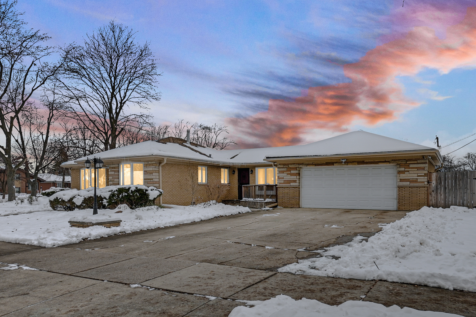 3740 153rd Street Midlothian, IL 60445 - Photo 2 of 20 a front view of a house with a yard and garage