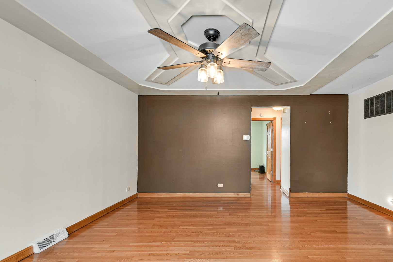 3740 153rd Street Midlothian, IL 60445 - Photo 7 of 20 a view of an empty room with wooden floor