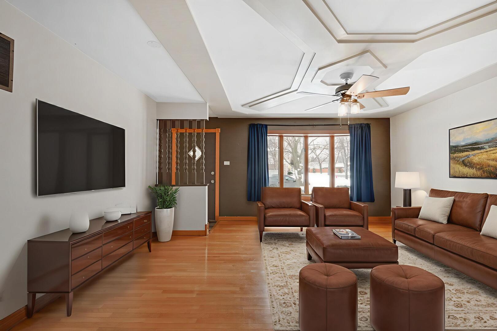 3740 153rd Street Midlothian, IL 60445 - Photo 8 of 20 a living room with furniture and a flat screen tv