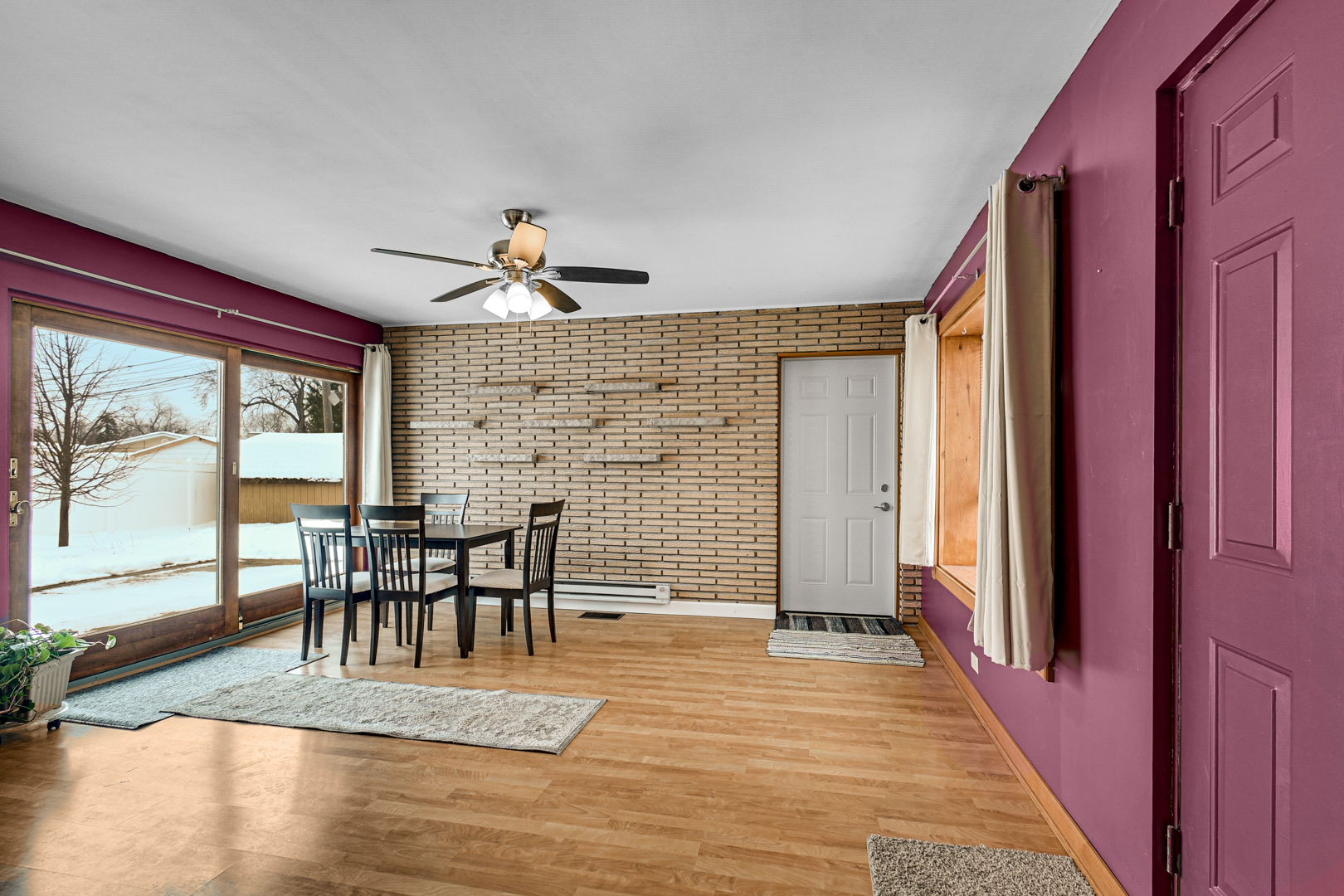 3740 153rd Street Midlothian, IL 60445 - Photo 10 of 20 a view of a dining room with furniture window and wooden floor