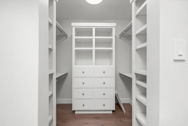 a view of an empty walk in closet