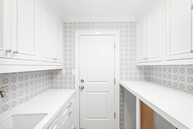 a bathroom with a sink and a bathtub