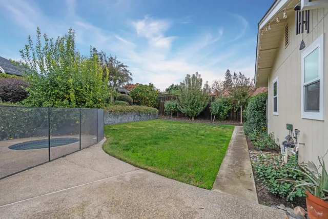 a view of a garden with a fountain