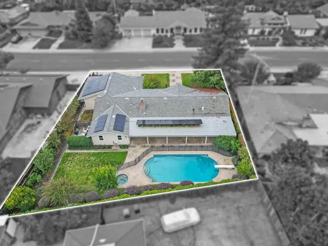 a view of outdoor space with swimming pool