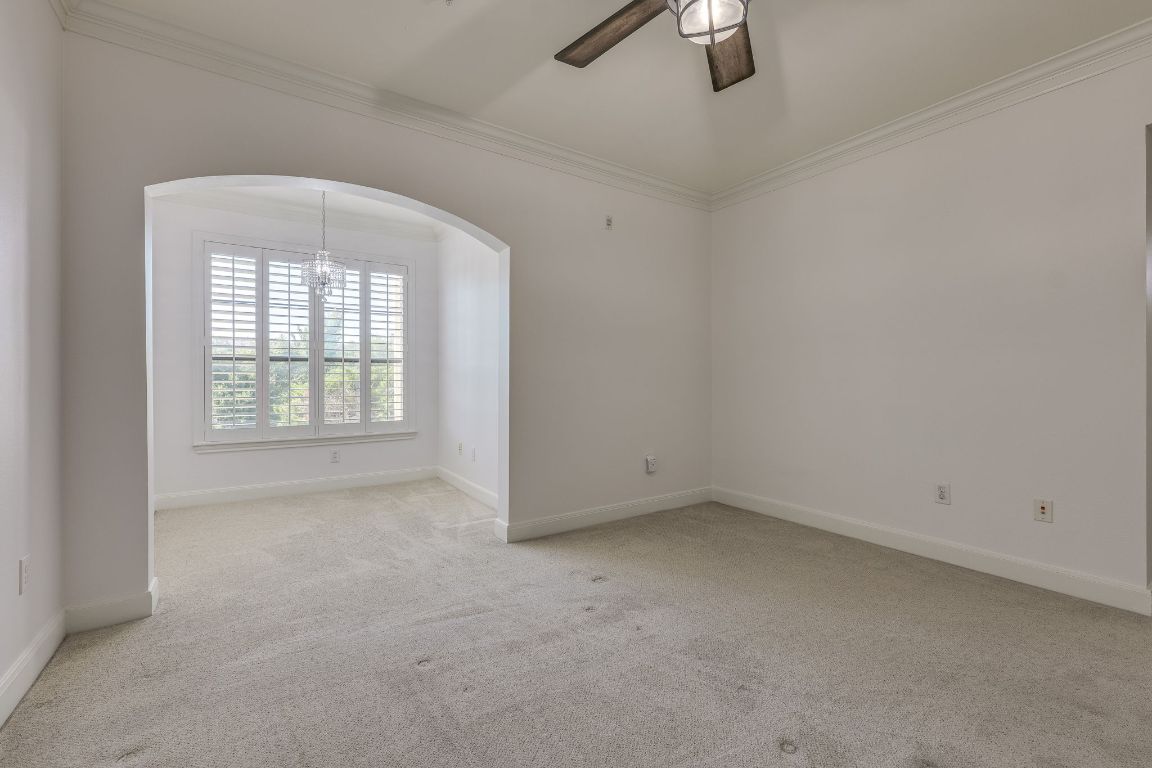 7701 Rialto Boulevard, Unit 1116 Austin, TX 78735 - Photo 2 of 26 an empty room with windows