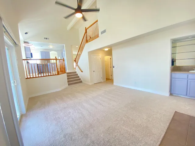 a view of a livingroom with staircase