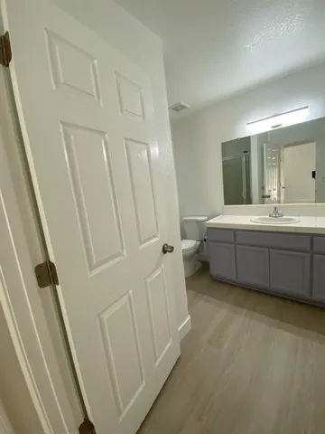 a bathroom with sink and mirror