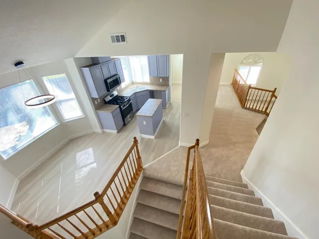 a view of a living room and entryway
