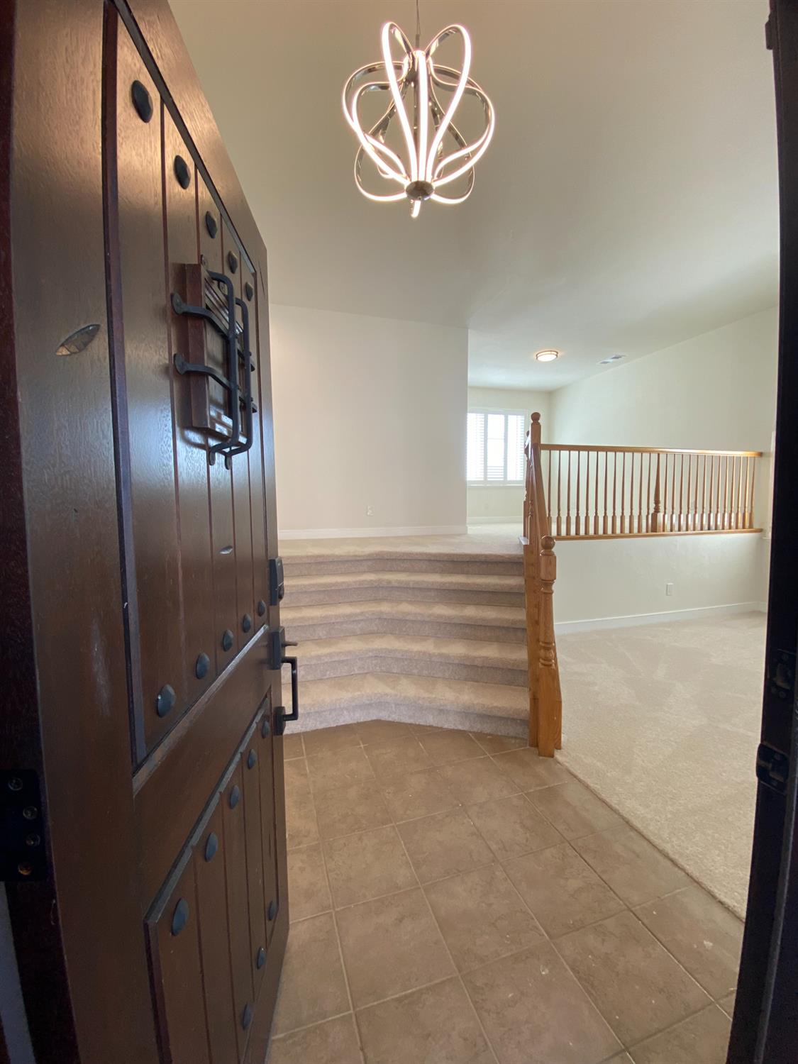 1716 Via Milano Gustine, CA 95322 - Photo 3 of 28 a view of staircase with white walls