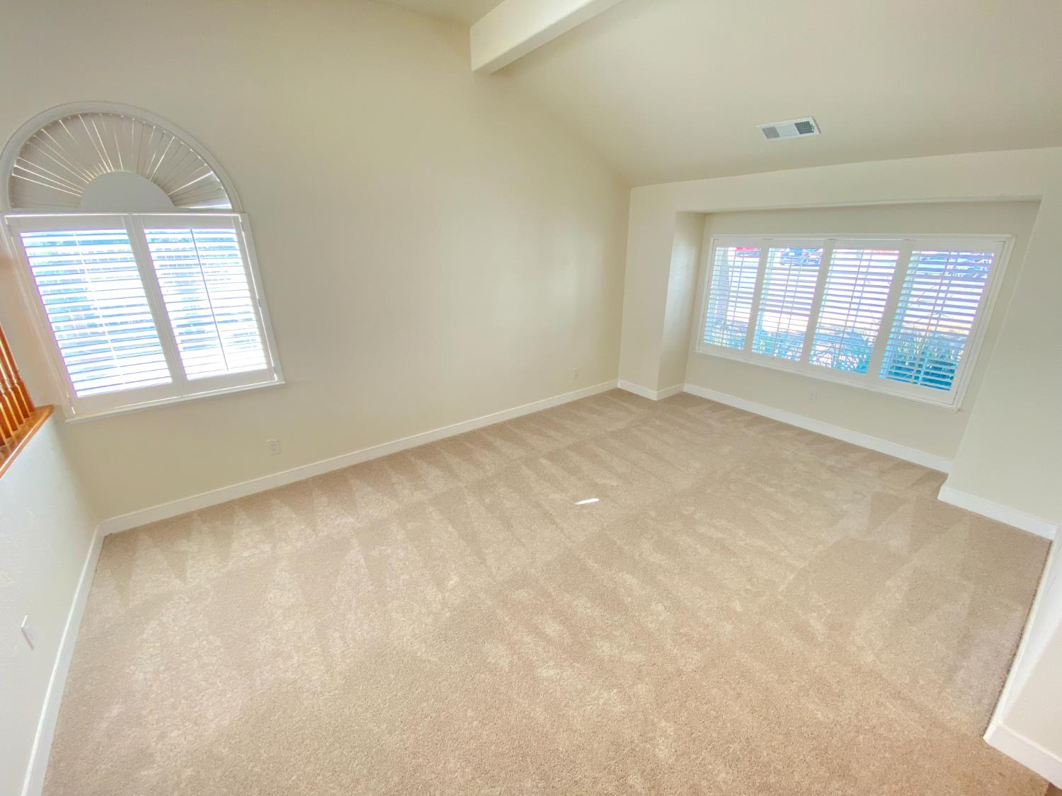 1716 Via Milano Gustine, CA 95322 - Photo 6 of 28 an empty room with a window