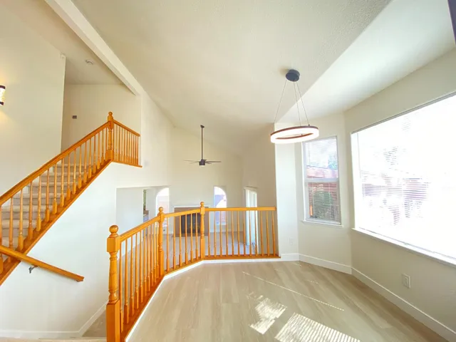 a view of a hallway with windows