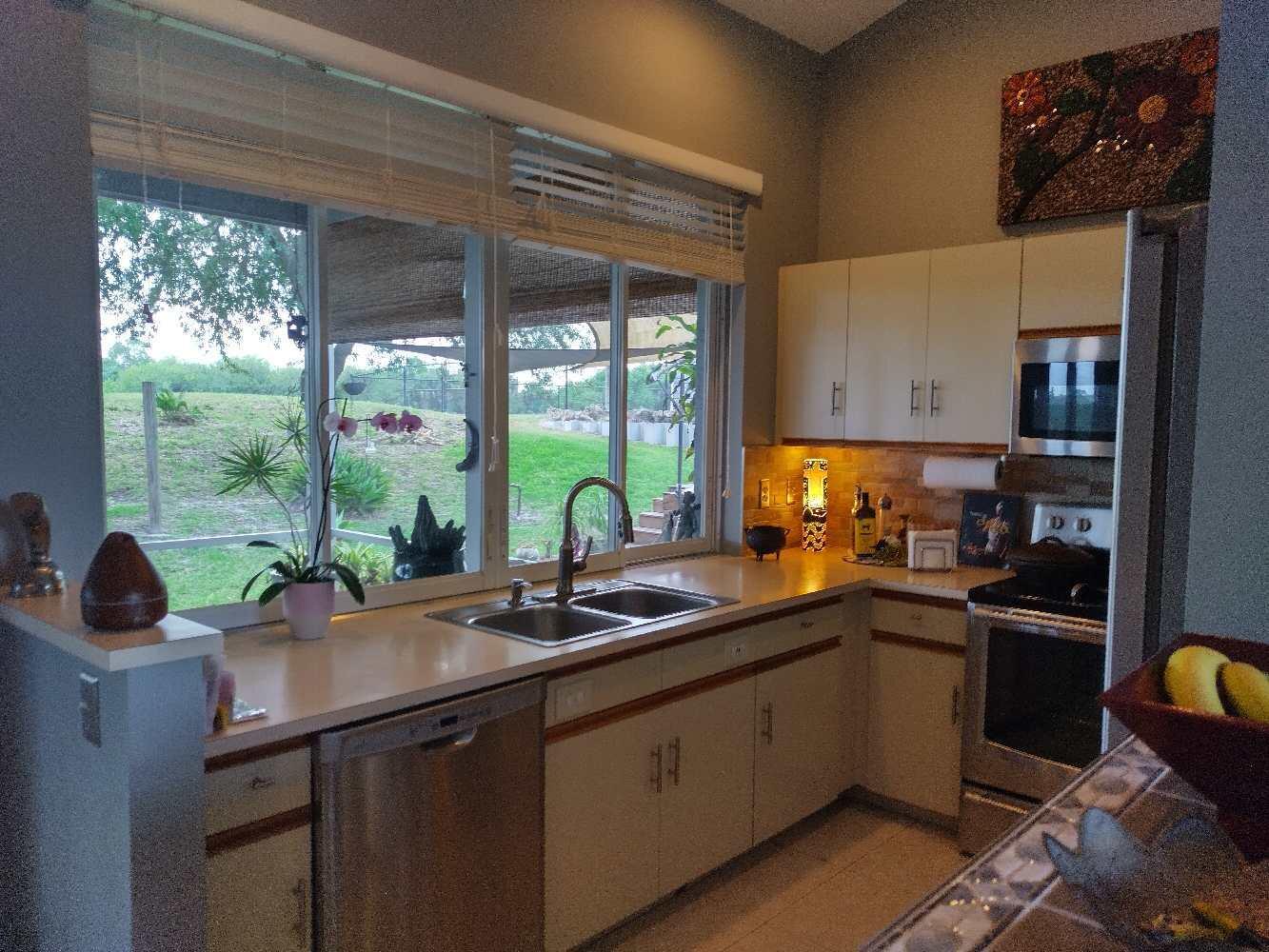 500 Southwest Aster Road Port St. Lucie, FL 34953 - Photo 11 of 36 500 SW Aster Rd Kitchen 2
