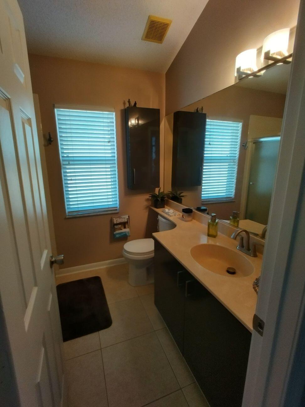 500 Southwest Aster Road Port St. Lucie, FL 34953 - Photo 16 of 36 500 SW Aster Road Guest Bathroom